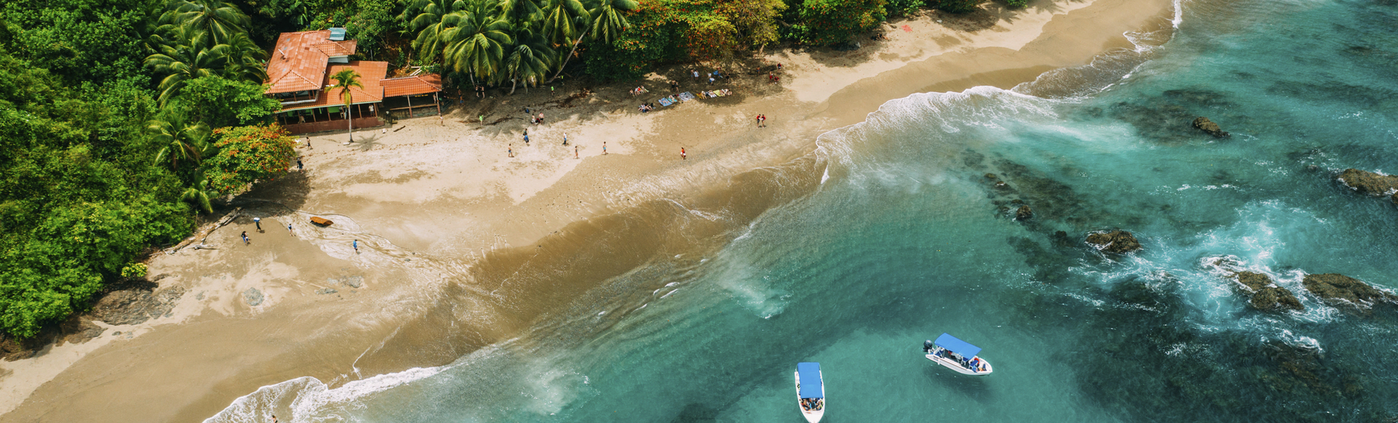 Aerial Drone View of a tropical island with lush jungle in Costa