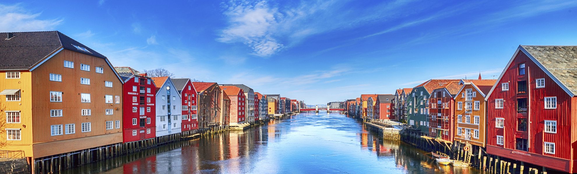 Colorful houses over water in Trondheim city - Norway