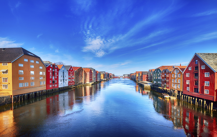 Colorful houses over water in Trondheim city - Norway